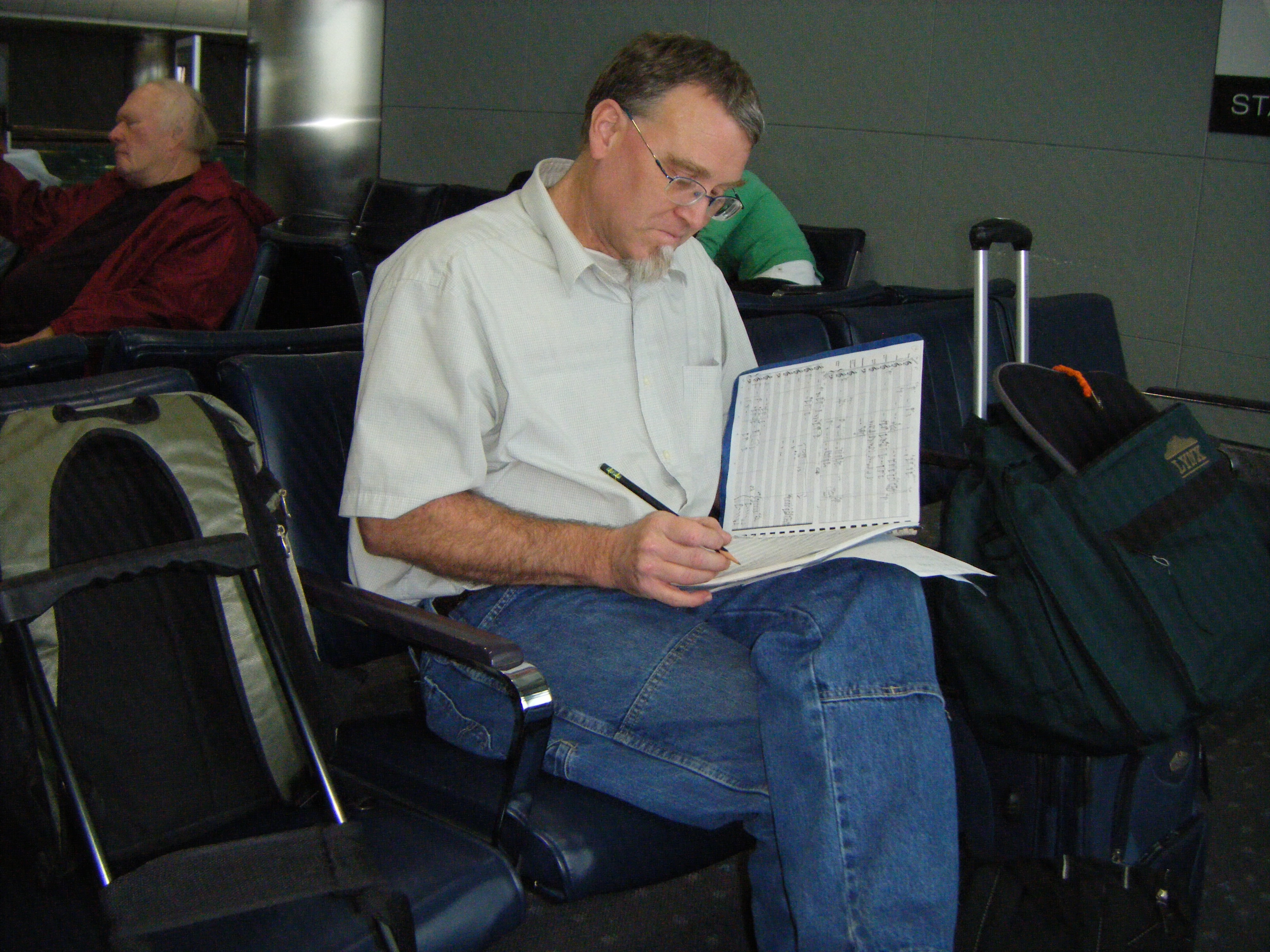Richard Burdick writing Op. 218 in the airport